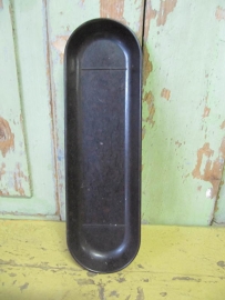 Old tray for pens made of bakelite