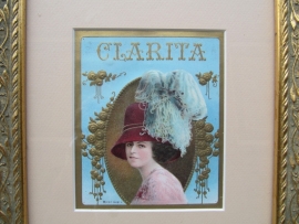 Antique gold frame with old image of Clarita