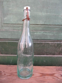 Old beer bottle with bracket