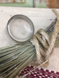 Brocante cylindrical clear glass bottle.