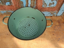 Old green enamel colander