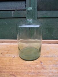 Brocante bottle in green glass