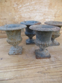 Old cast iron garden urn