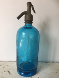 Antieke blauwe spuitfles