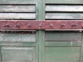 Brocante wooden coat rack with seven wooden hooks.