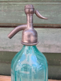 Old  green seltzer bottle with inscription