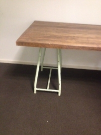 Large work table with metal frame and thick sheet