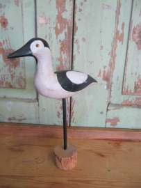 Oude houten vogel