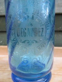 Seltzer soda bottle in blue with inscription