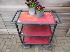 French heavy metal vintage serving trolley on big wheels