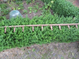 Beautiful French brocante long completely wooden coat rack with hooks 9