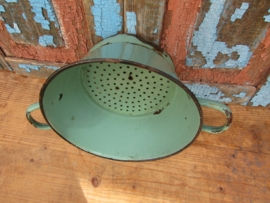 Old green enamel colander