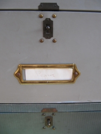 Very old gray filing box with brass fittings