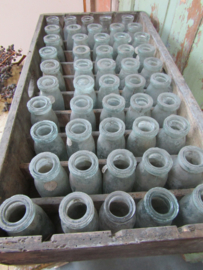 Large antique crate with bottles