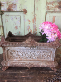 Antieke set gietijzeren jardinière