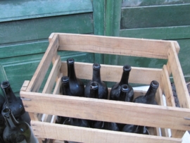 Wooden box with 10 antique wine bottles