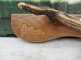 Nice part of a deer antler on shelf