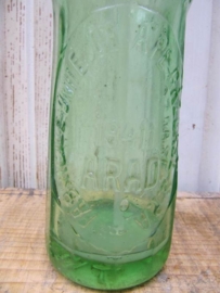 Antieke spuitfles in groen