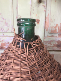 Oude fles Dame Jeanne XL met mand