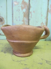 Antique stoneware jar for stove