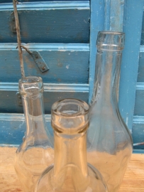 Set of 3 clear glass pear-shaped old bottles