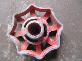 Old metal faucet handle red
