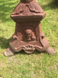 Old high cast iron candlestick
