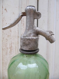 Old green seltzerbottle