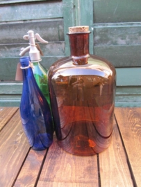 Old brown bottle of 5 liters