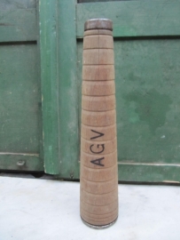 Old wooden high thread spool with the letters AGV