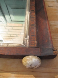 Old mirror with carved wood