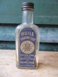 Antique oil bottle with label Touring Club de Belgique