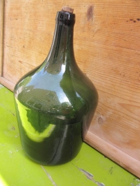 Old green bottle with cork