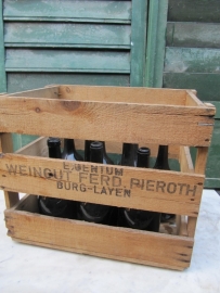 Wooden box with 10 antique wine bottles