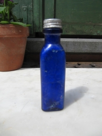 Antique French blue triangular bottle