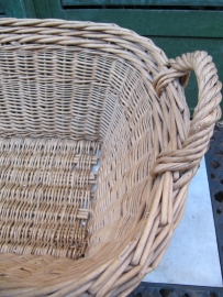 Ancient big wicker basket with one ear