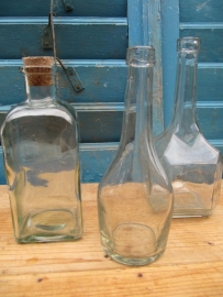 3 pieces of old bottles in different shapes