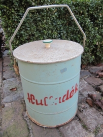 Old green bin with lid