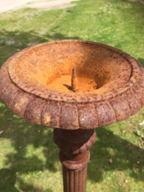 Old high cast iron candlestick