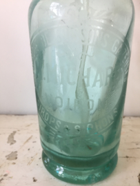 Oude kleine spuitfles met opdruk 1/2 liter