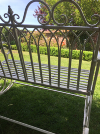 Old metal swing bench