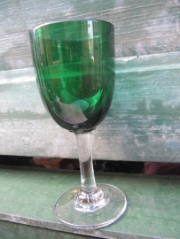 Green glass on foot