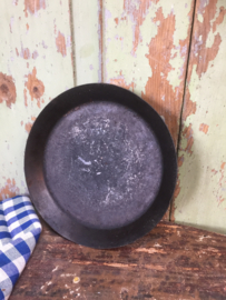 Oud plat bakblik