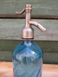 Seltzer soda bottle in blue with inscription