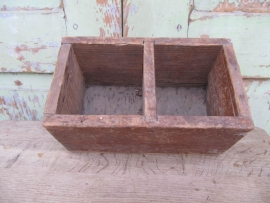 Two-compartment wooden box.