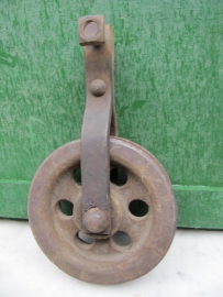 Very nice old riveted metal pulley