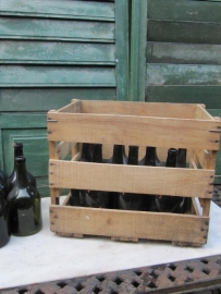 Wooden box with 10 antique wine bottles