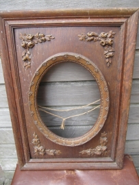 Antique old frame with oval opening