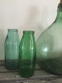 Oude fles met brede hals