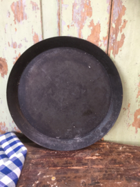 Oud plat bakblik